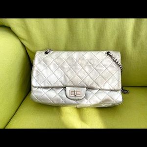 Chanel 2.55 Large Silver handbag.